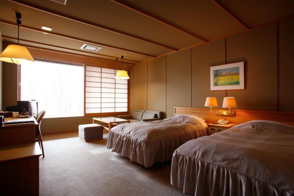 Shikotsuko Daiichi Hotel Suizantei Тітосе Номер фото